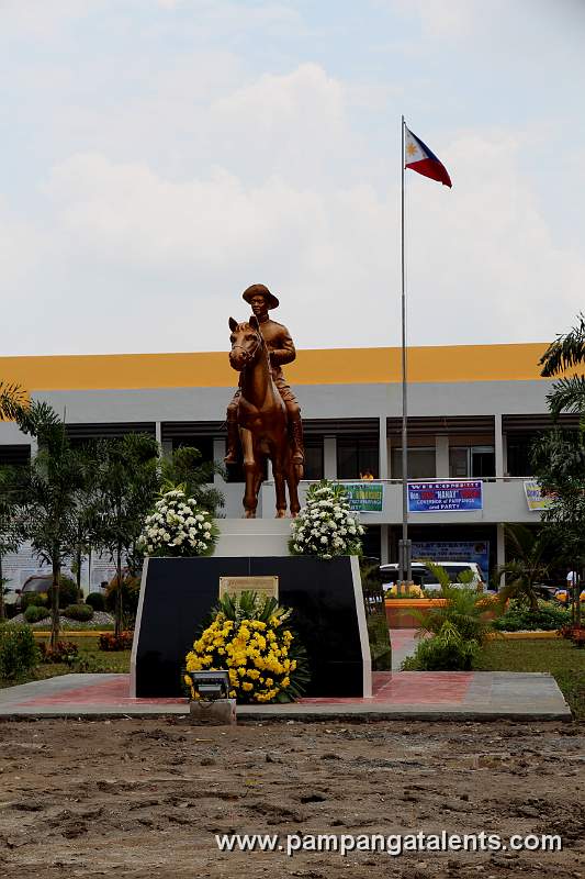 Gen. Jose Alejandrino Monument and the Philippine Flag infront of Arayat Municipal Hall.