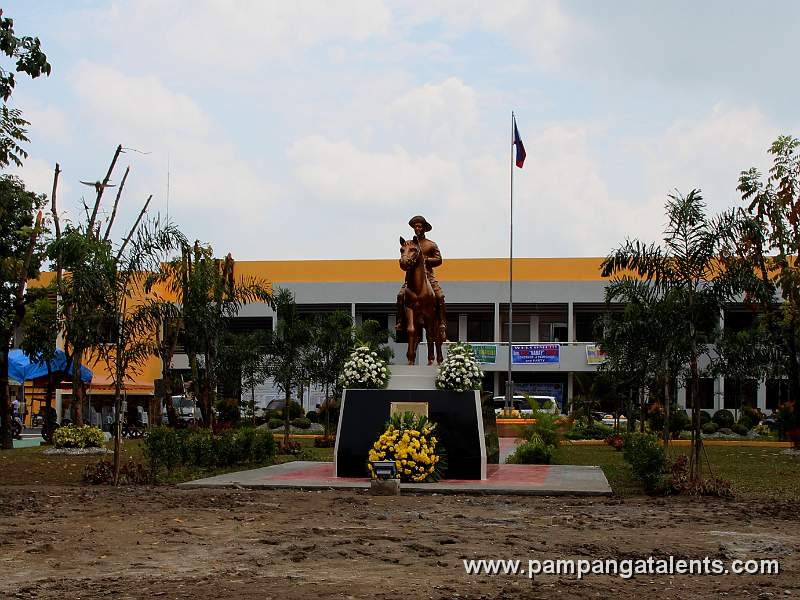 Gen. Jose Alejandrino Monument behind is the newly renovated Arayat Municipal Hall.