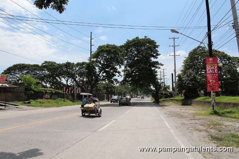 Vehicles along Lazatin blvd. Road towards Capitol Blvd. City of San Fernando Pampanga