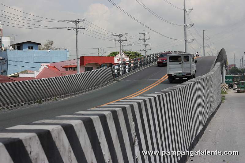 Vehicles crossing the Lazatin Flyover