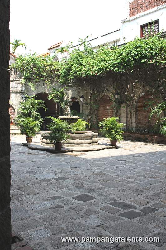 Interior of Casa Manila with adobe bricks flooring.