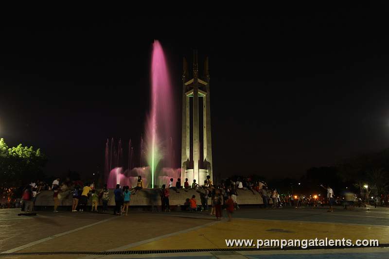 Fountain inside Quezon Memorial Circle at night.