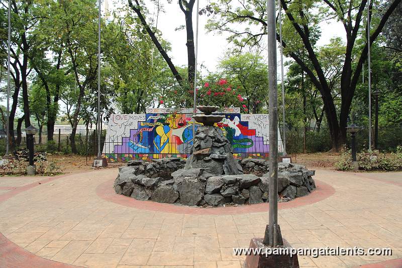 Fountain with the Peace Wall in Background inside the World Peace Bell Park.