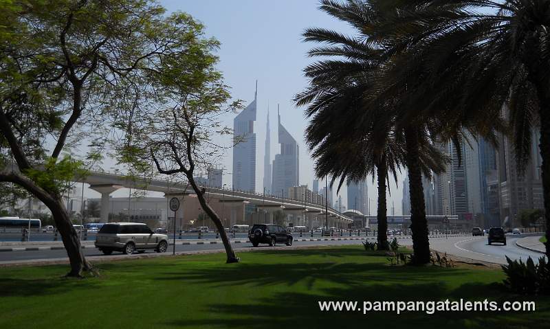 Burj Khalifa between the Emirates towers (Trade Centre Roundabout view)